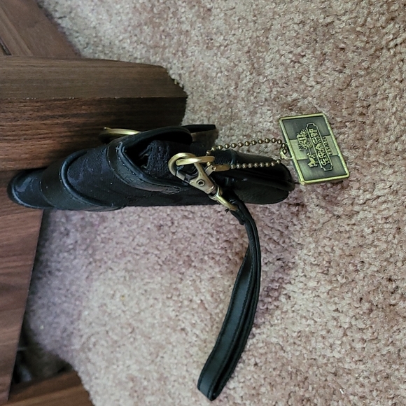 - Coach wristlet black super cute large enough for phone. - Picture 13 of 16